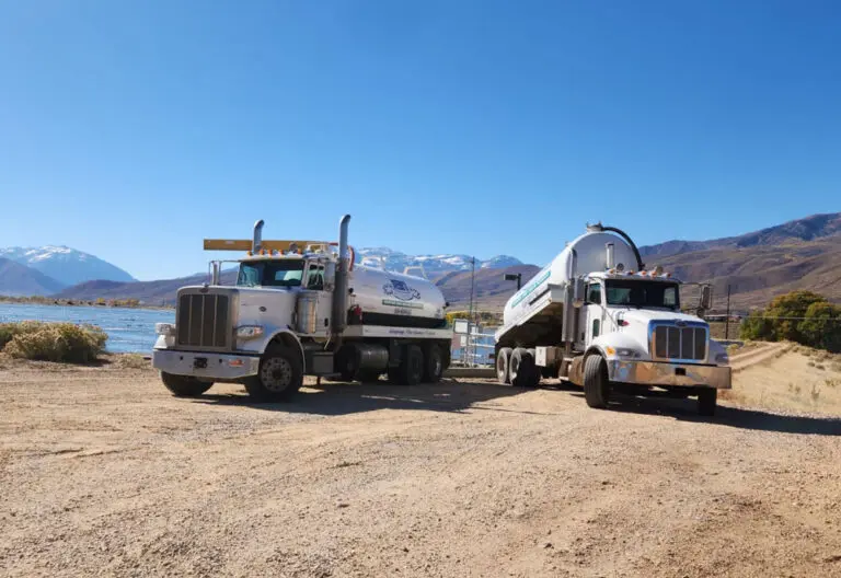 Trucks-by-lake Webb's Select-A-Service Trucks by a lake